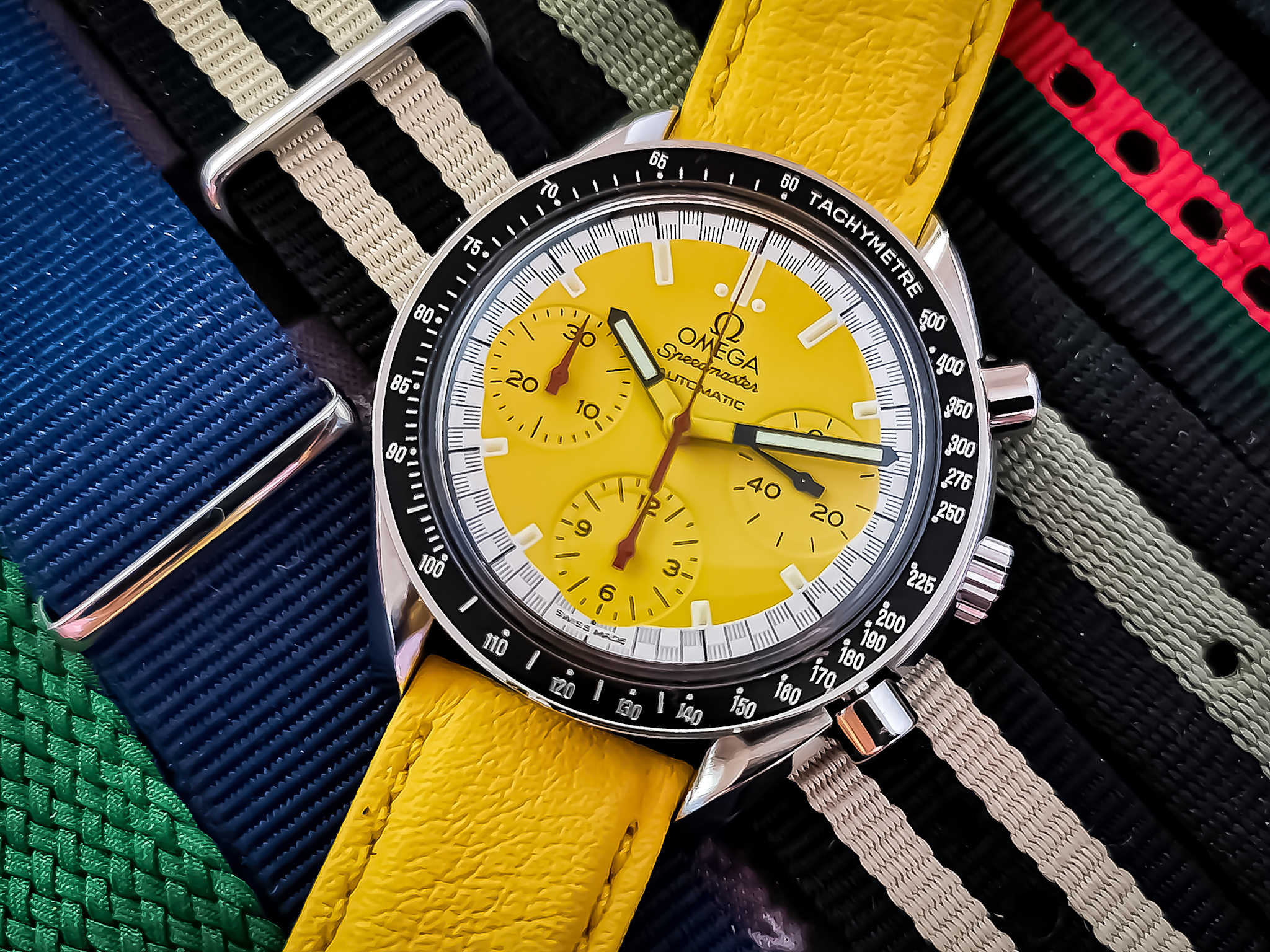 Owner Review: Omega Speedmaster Racing Schumacher – A Splash Of Colour!