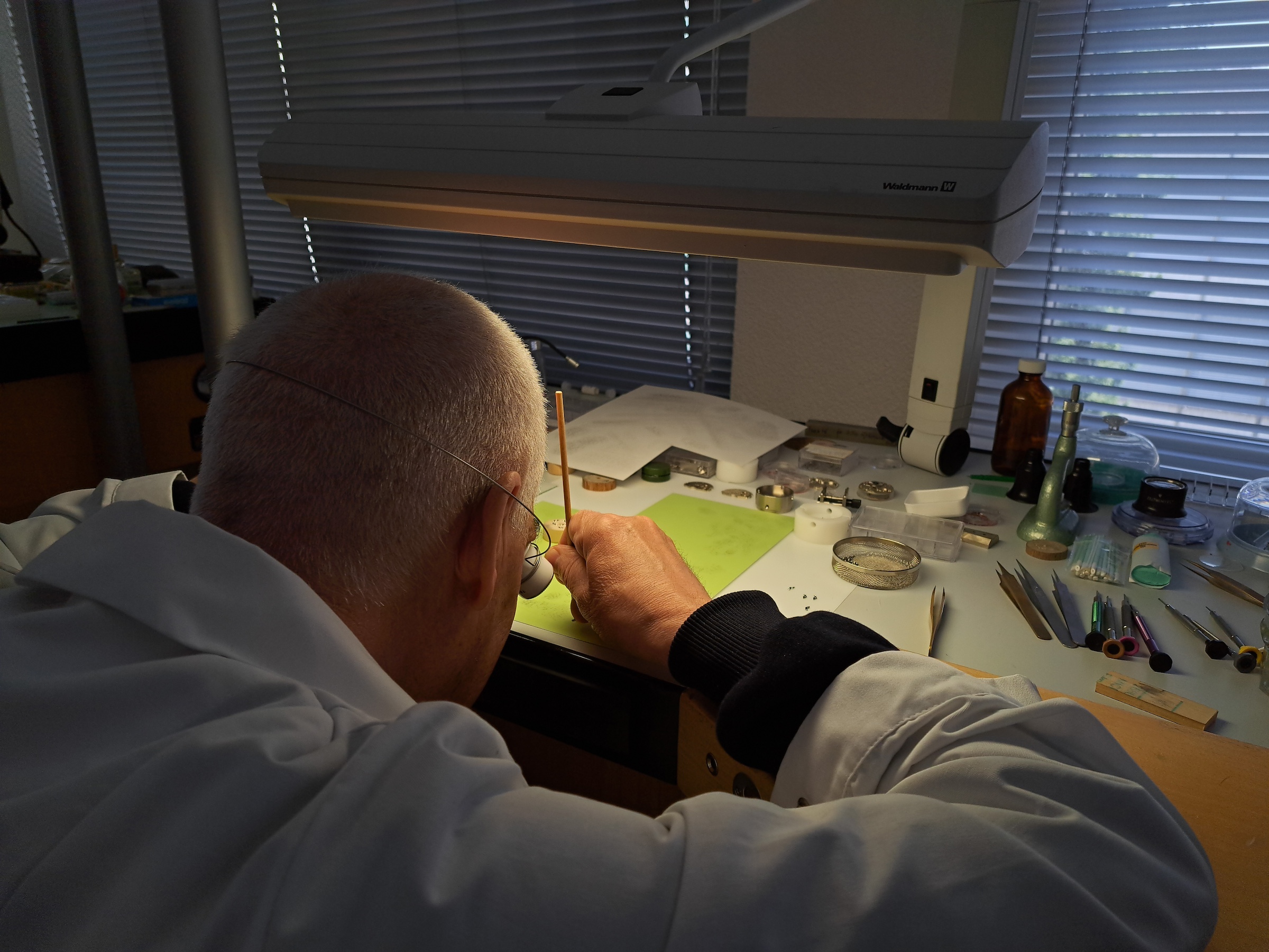 watchmaker at his bench